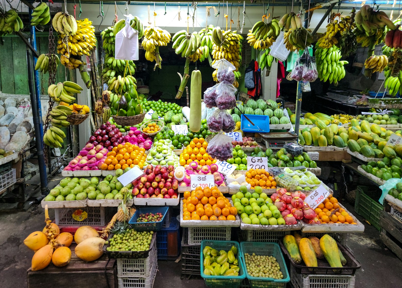 Nigeria Inflation: A fruit stand is loaded with colorful produce.