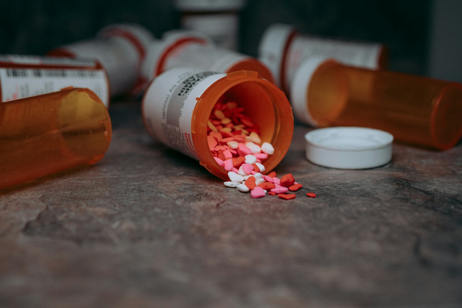 Drug Trafficking Network: a close up of a bottle of pills on a table