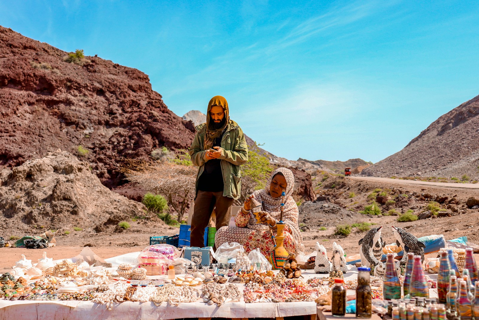 Women Entrepreneurs Funding: woman in black tank top and blue denim shorts standing on brown sand during daytime